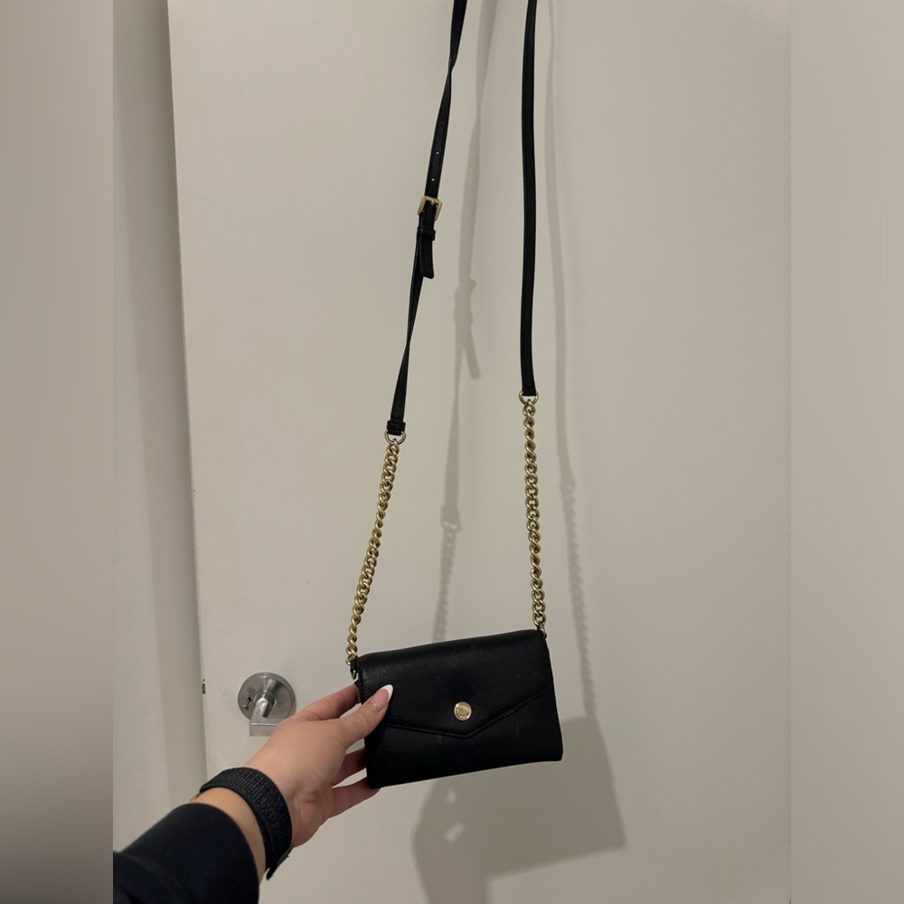 37. Michael Kors Crossbody Wallet